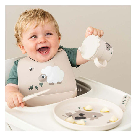 Piatto per bambini Done by Deer piccola fattoria beige