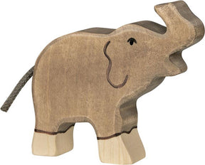 Elefante Goki holztiger, piccolo, con la proboscide rivolta verso l'alto.