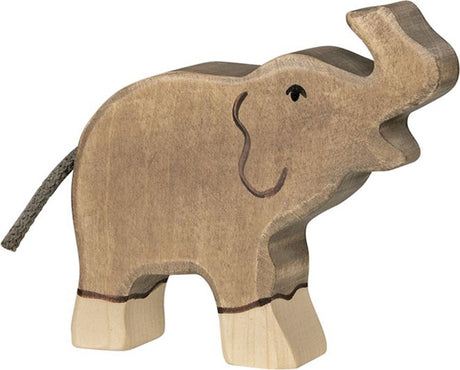 Elefante Goki holztiger, piccolo, con la proboscide rivolta verso l'alto.