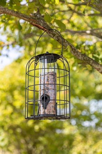 Dispenser per alimenti Trixie con protezione in rete nera
