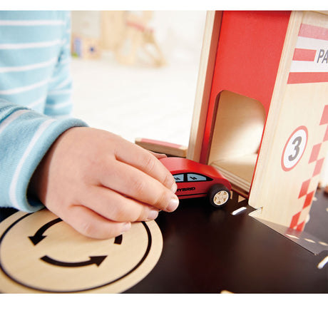 Hape park go garage - garage giocattolo con ascensore, elicottero e auto, dai 3 anni in su
