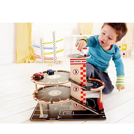 Hape park go garage - garage giocattolo con ascensore, elicottero e auto, dai 3 anni in su