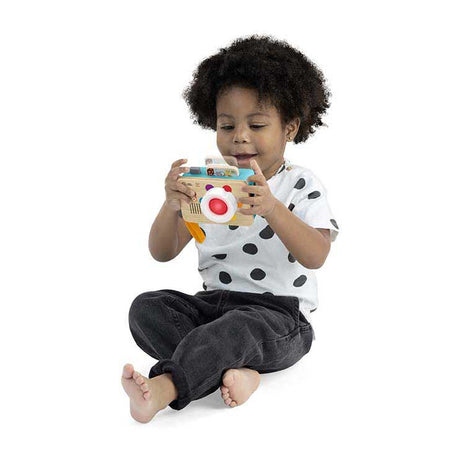 Macchina fotografica giocattolo con obiettivo didattico Hape