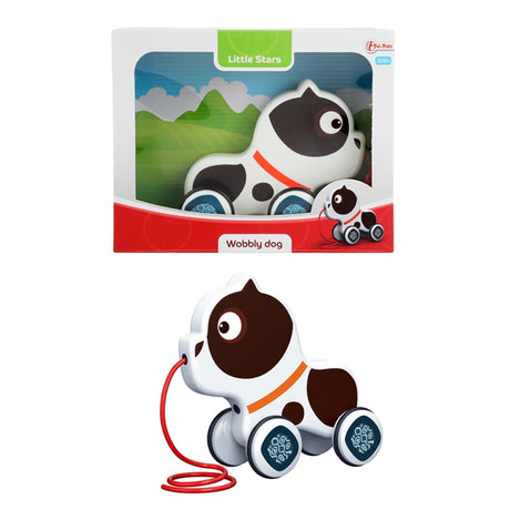 Toi-toys toi giocattoli stelline tirano la figura di un cane traballante