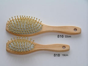 Spazzola per capelli in legno da 22 cm