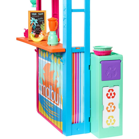 Barbie adora gli accessori per le bambole della baracca sulla spiaggia dell'oceano