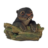 Figura di lontra spray galleggiante Ubbink sulla fontana del tronco d'albero