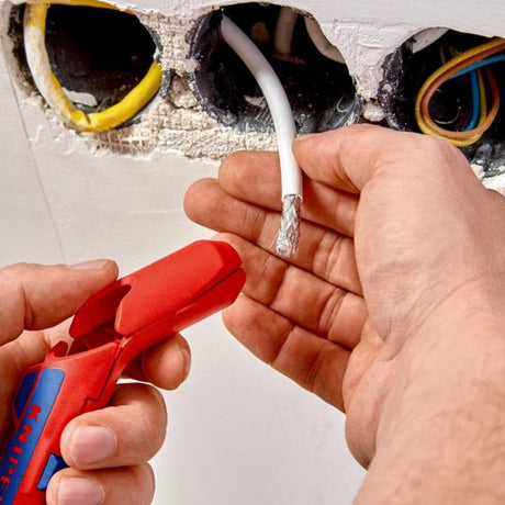 Attrezzo di smontaggio universale Knipex - ergostrip sinistro - rosso